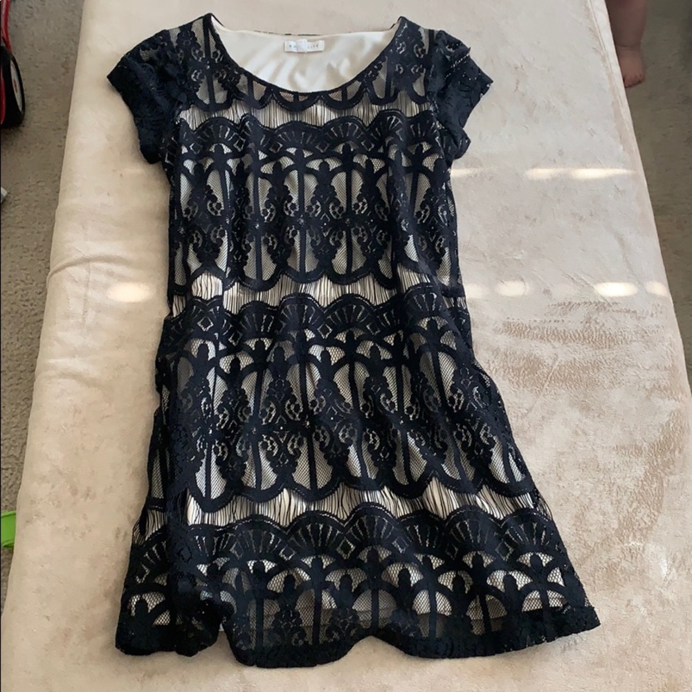 Beige and black lace cocktail dress